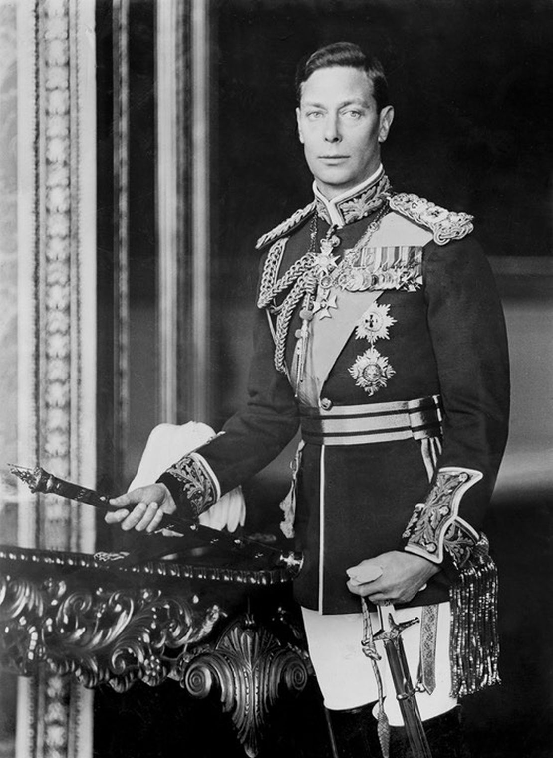 King George VI dies and Queen Elizabeth II becomes monarch